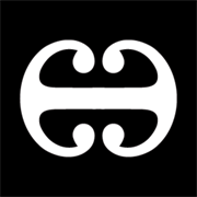 Picture of a the kowhaiwhai spine label used on items in the Māori collection.