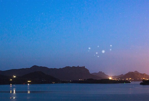 Picture of Whangārei Harbour with a representation of the Matariki star cluster. 