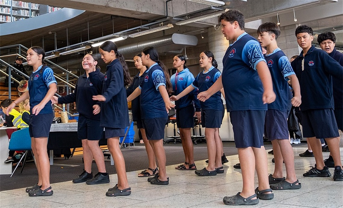 Whangārei Intermediate School students performing kapa haka in Whangārei Central Library. 