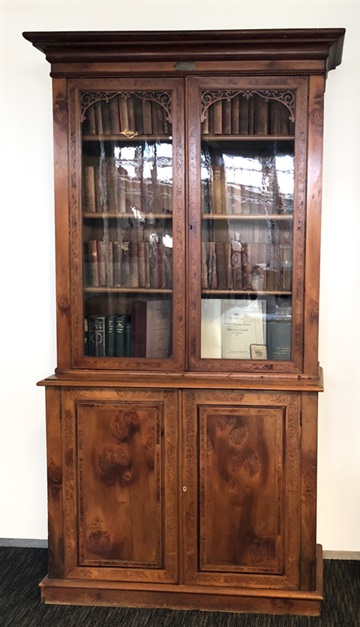 Picture of the cabinet that once belonged to May Bain and was bequeathed to the library.