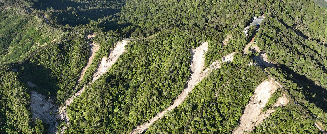 Slips on Memorial Drive going to the Mount Parihaka summit lower car park after Cyclone Gabrielle in 2023. 
