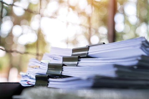 Stack of paperwork. 