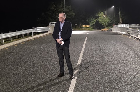 Mayor of Whangarei Ken Couper standing on Gillingham Road Bridge for its dawn blessing and official opening on 23 March 2026. 