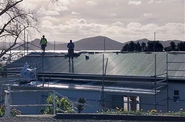 Thanks to community funding, the McLeod Bay Hall now boasts a brand-new roof, ensuring it remains an important gathering space. 