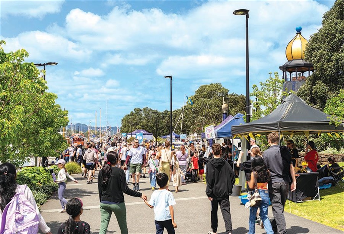 Photo of the crowds in the Town Basin and along the waterfront at the 2025 Whangārei Maritime Festival. 