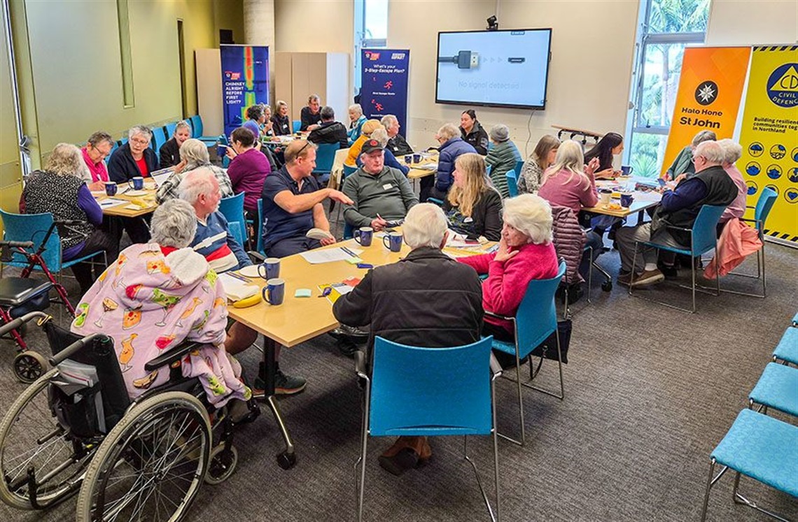 Older adults at Whangārei Central Library for the Small Steps Towards Building Resilience workshop held in July 2026. 