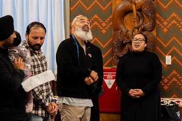 Local Māori sing to welcome newcomers at the Welcoming Communities pōwhiri. 