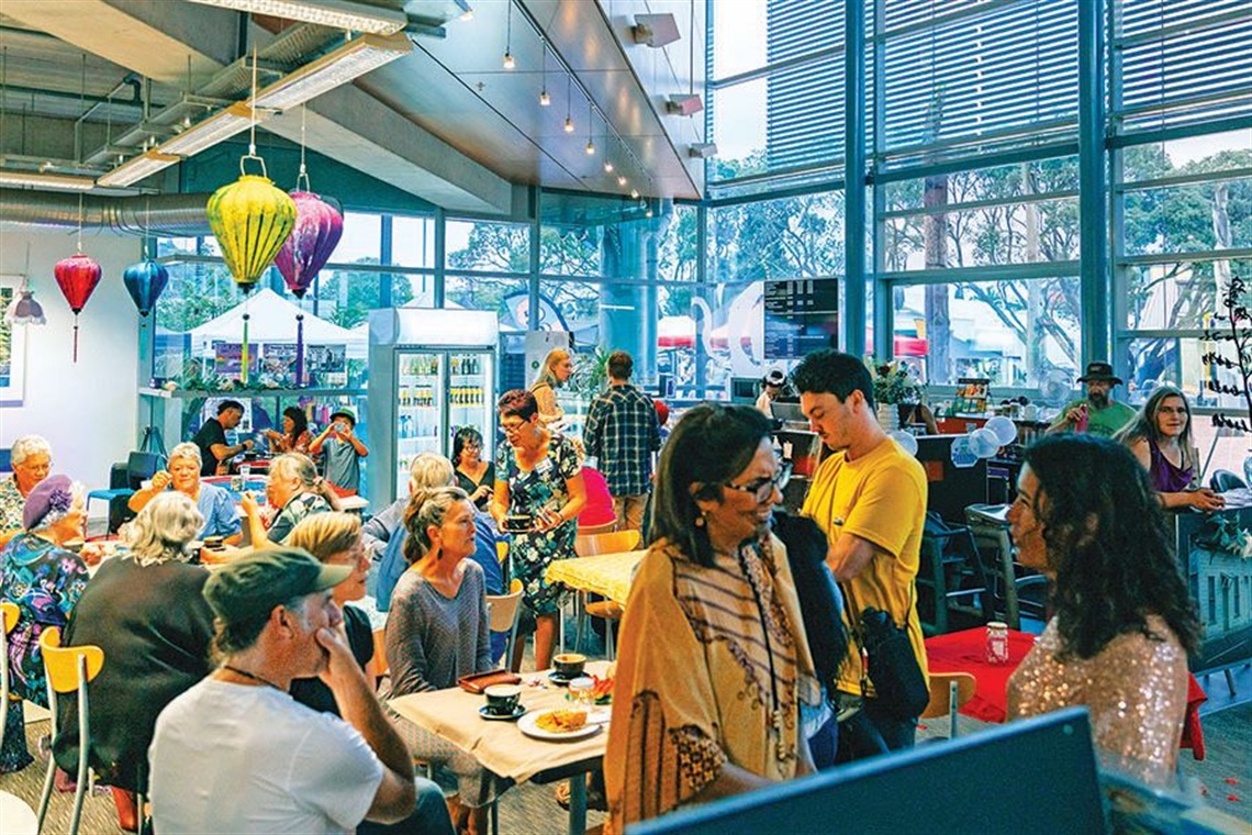 The Central Library's cafe is buzzing with activity during the Night Café Whangārei event for the Love it Here Festival on Valentine’s Day in February 2025.