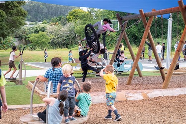 Children play at Raumanga Scenic Reserve Playground.