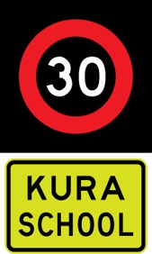 Electronic variable school speed limit sign.