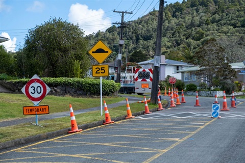 Orange cones placed on road for roadworks. 