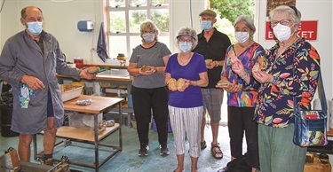 An event about polishing rocks during Silver Festival 2021.