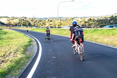 Cyclists on circuit track at Bike Park on Pohe Island.