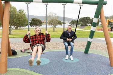 Swings at the Pohe Island destination playground.